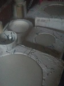Pouring the slip to make scribble bowls
